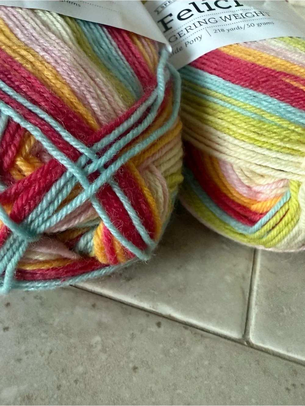 Felici Fingering Weight Yarn - Multicolor Pastel Stripes 2 Skeins Side Pony